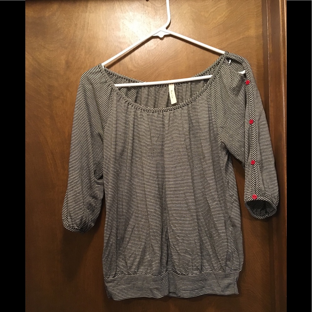 Striped shirt with buttons on sleeve